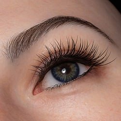 Implanted synthetic hair - directly implanted into the doll’s head (more durable).